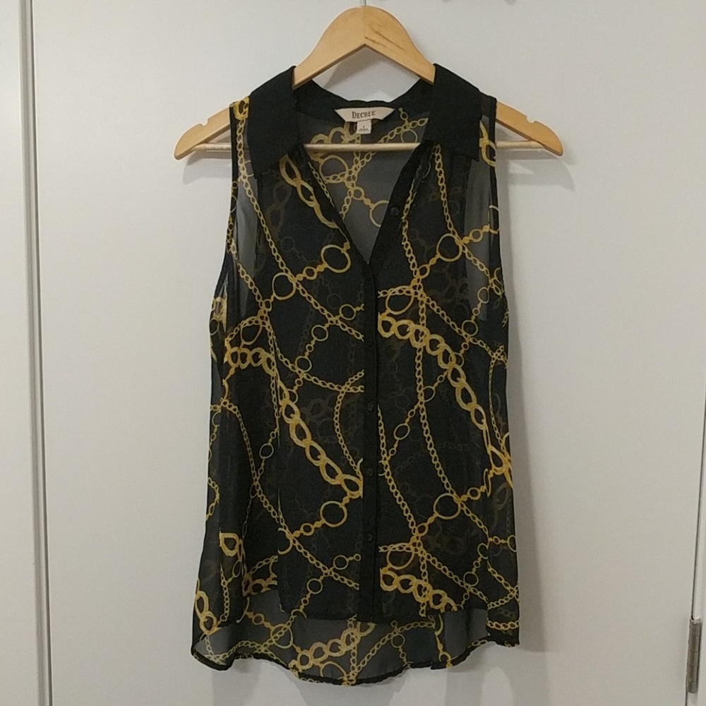 Fun and flirty sleeveless blouse!